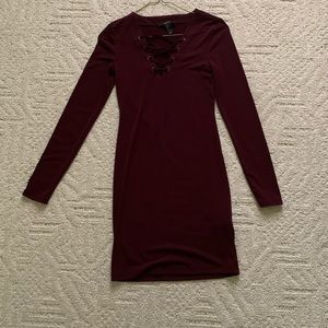 A long sleeve pencil dress